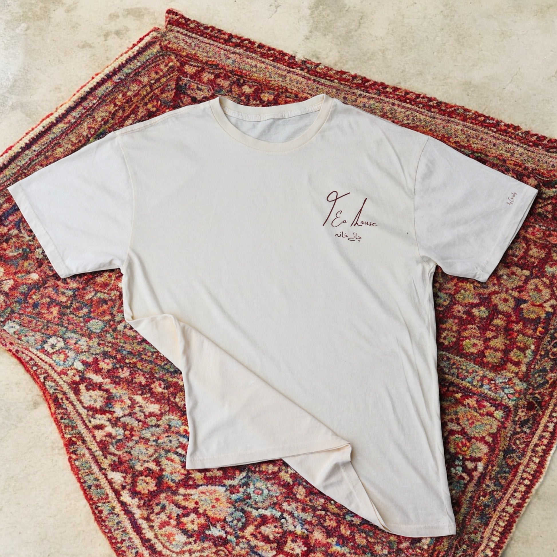 “Where Stories Are Poured” - Oversized Off-White Acid-Washed 100% Cotton Tee